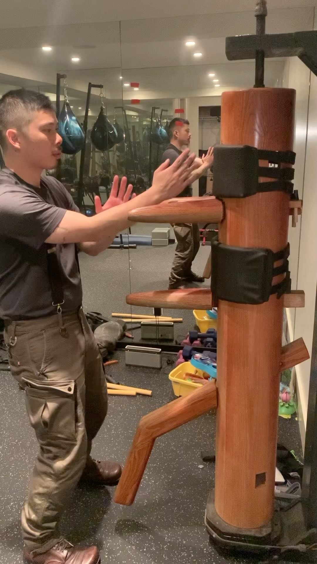 Students practicing gung fu techniques in class